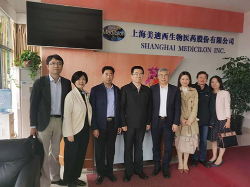 中国药科大学党委书记金能明与旋乐吧spin8首席执行官陈春麟博士